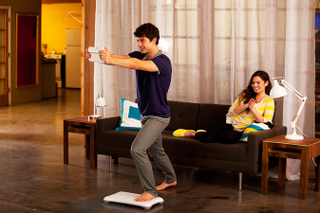 Illustration for article titled It's Time for Pictures of People Looking Like Idiots Playing the Wii U